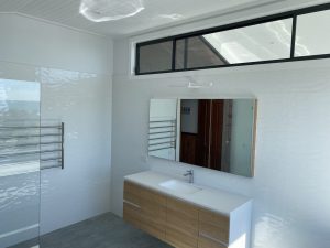 Gerringong & Gerroa bathroom renovations by Milliken Builders custom-made window