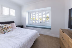 Hampton style facade renovations square bay window with built in window seat