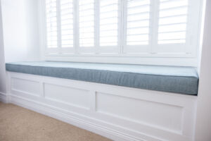 Hampton style facade renovations square bay window with built in window seat